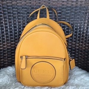 GUESS DMC Mustard Yellow  BackPack Purse